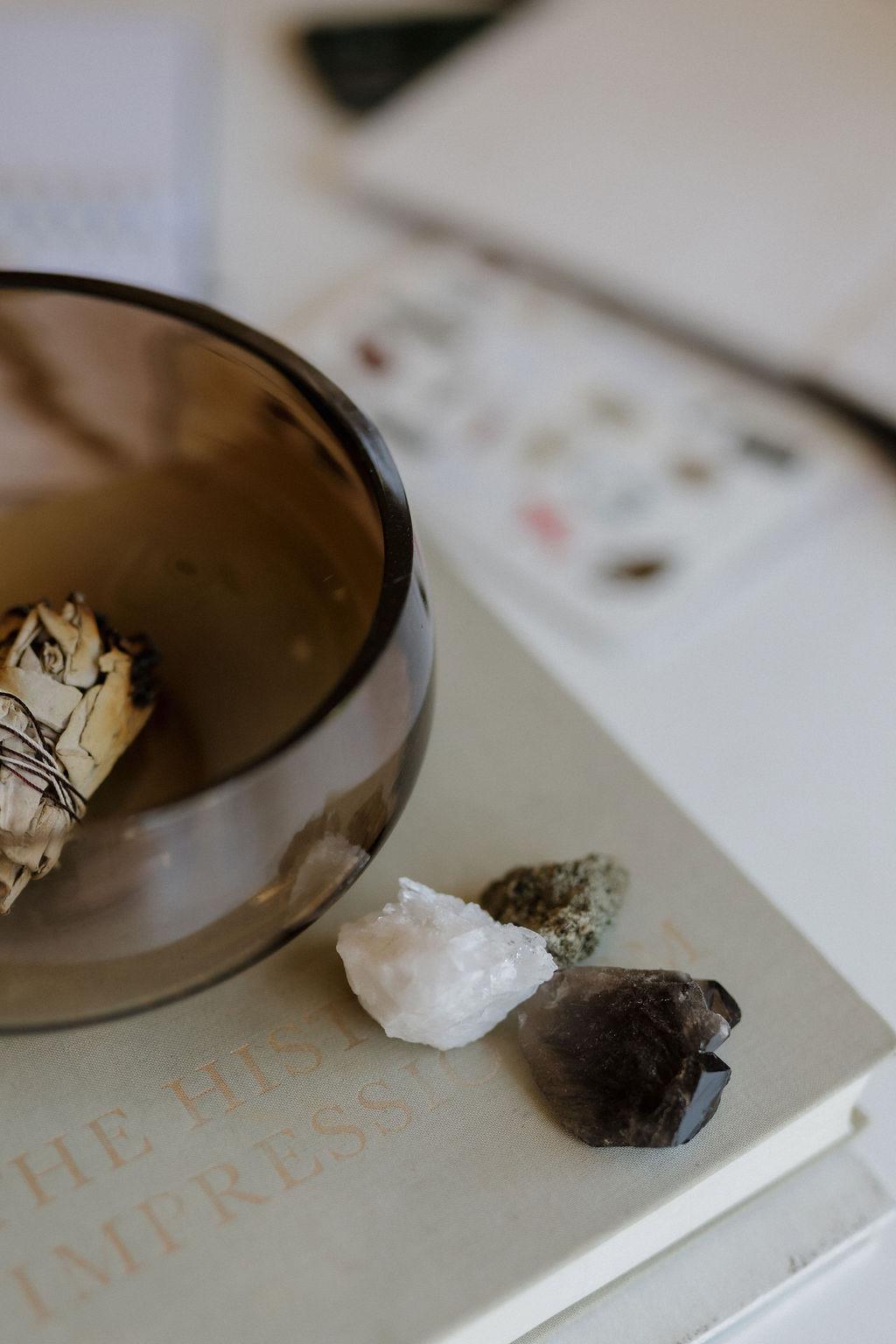 A still life with crystals and a bowl